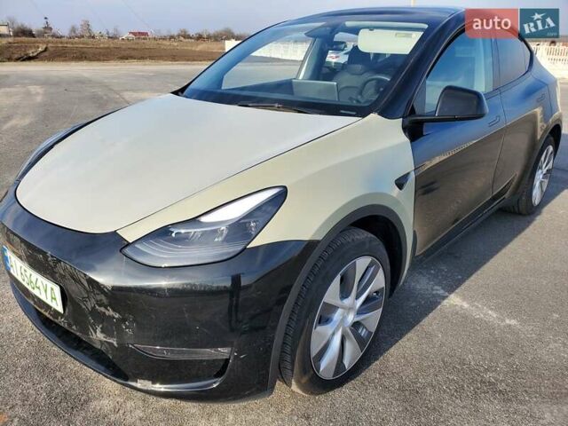 Чорний Тесла Model Y, об'ємом двигуна 0 л та пробігом 12 тис. км за 23300 $, фото 1 на Automoto.ua