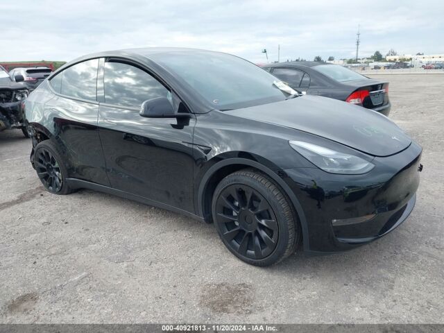 Черный Тесла Model Y, объемом двигателя 0 л и пробегом 13 тыс. км за 23900 $, фото 1 на Automoto.ua