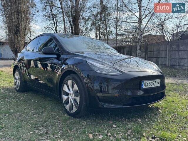Черный Тесла Model Y, объемом двигателя 0 л и пробегом 30 тыс. км за 29000 $, фото 1 на Automoto.ua