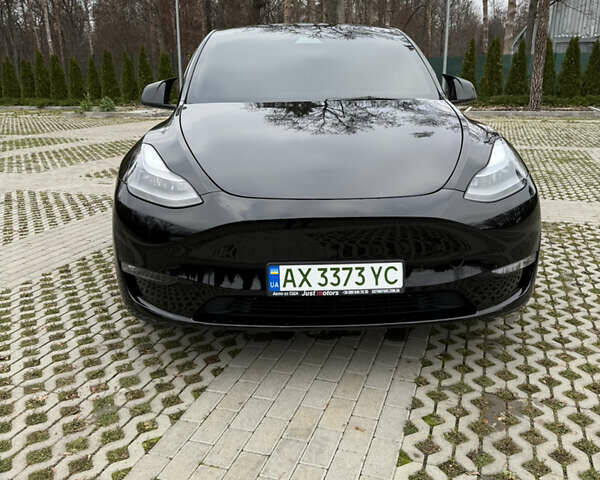 Черный Тесла Model Y, объемом двигателя 0 л и пробегом 80 тыс. км за 28000 $, фото 1 на Automoto.ua