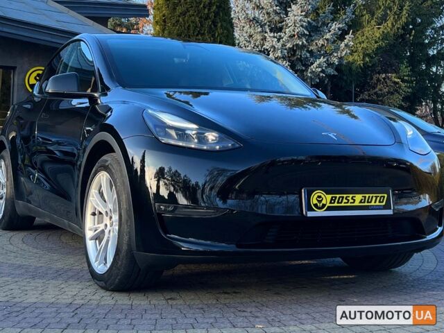 Черный Тесла Model Y, объемом двигателя 60 л и пробегом 25 тыс. км за 28700 $, фото 1 на Automoto.ua