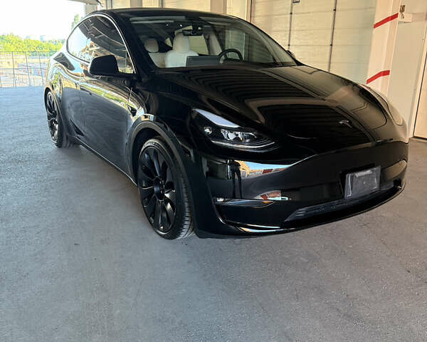 Черный Тесла Model Y, объемом двигателя 0 л и пробегом 28 тыс. км за 35700 $, фото 1 на Automoto.ua