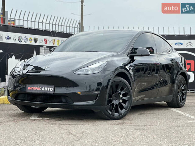 Черный Тесла Model Y, объемом двигателя 0 л и пробегом 32 тыс. км за 29900 $, фото 1 на Automoto.ua