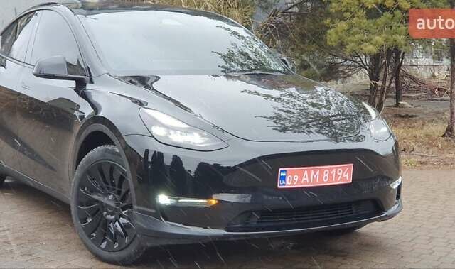 Черный Тесла Model Y, объемом двигателя 0 л и пробегом 25 тыс. км за 28900 $, фото 1 на Automoto.ua