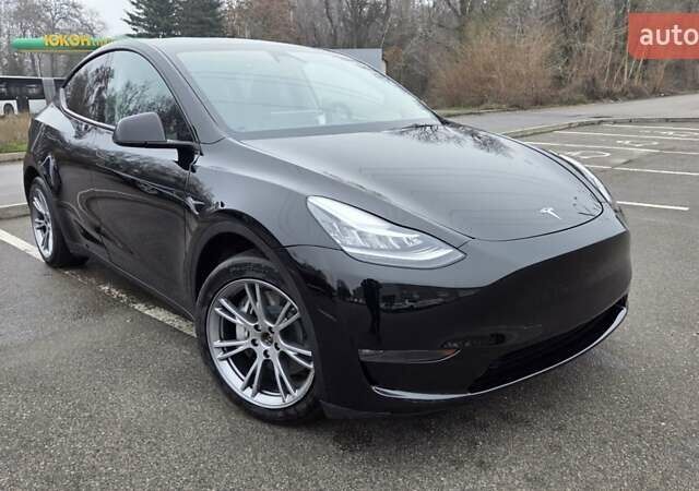 Черный Тесла Model Y, объемом двигателя 0 л и пробегом 49 тыс. км за 28900 $, фото 1 на Automoto.ua