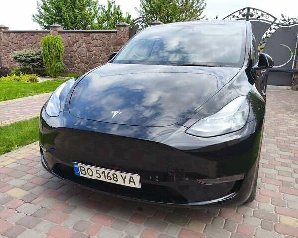 Черный Тесла Model Y, объемом двигателя 0 л и пробегом 23 тыс. км за 26900 $, фото 1 на Automoto.ua