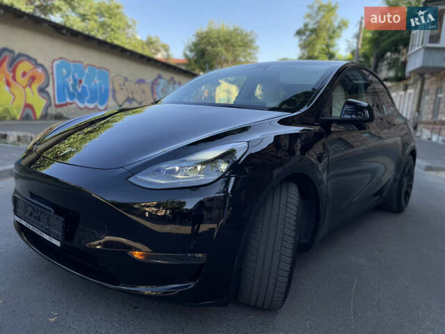 Черный Тесла Model Y, объемом двигателя 0 л и пробегом 36 тыс. км за 32000 $, фото 1 на Automoto.ua