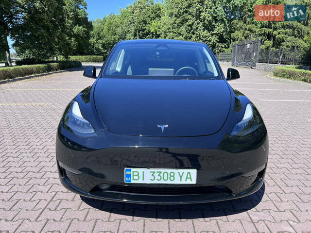 Чорний Тесла Model Y, об'ємом двигуна 0 л та пробігом 46 тис. км за 26999 $, фото 1 на Automoto.ua