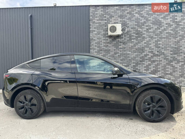 Черный Тесла Model Y, объемом двигателя 0 л и пробегом 2 тыс. км за 38300 $, фото 1 на Automoto.ua