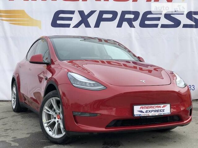 Червоний Тесла Model Y, об'ємом двигуна 0 л та пробігом 60 тис. км за 56999 $, фото 1 на Automoto.ua