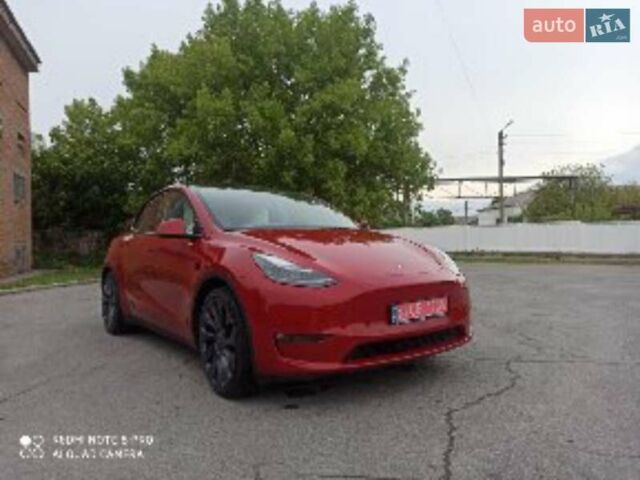 Красный Тесла Model Y, объемом двигателя 0 л и пробегом 74 тыс. км за 23600 $, фото 1 на Automoto.ua