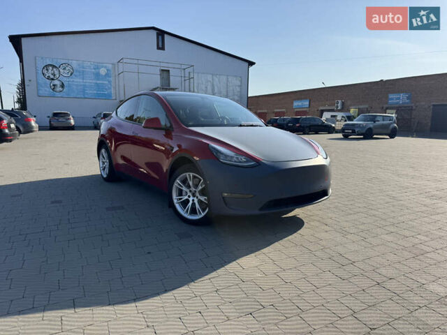 Красный Тесла Model Y, объемом двигателя 0 л и пробегом 121 тыс. км за 23000 $, фото 1 на Automoto.ua