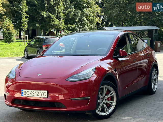 Красный Тесла Model Y, объемом двигателя 0 л и пробегом 127 тыс. км за 22499 $, фото 1 на Automoto.ua