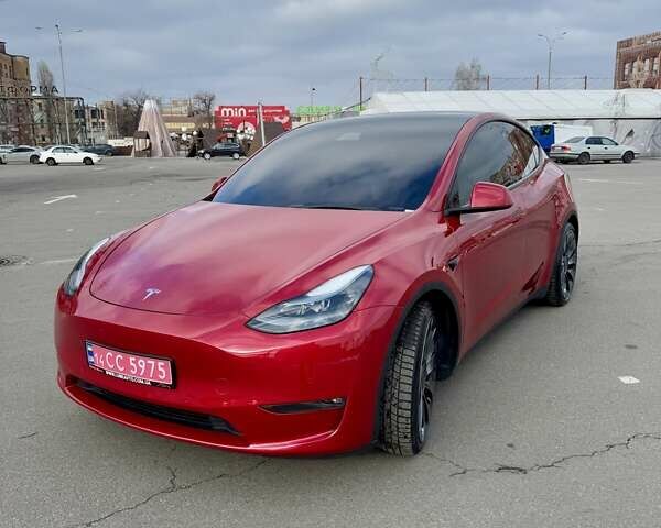 Красный Тесла Model Y, объемом двигателя 0 л и пробегом 35 тыс. км за 27999 $, фото 1 на Automoto.ua