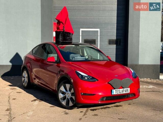 Красный Тесла Model Y, объемом двигателя 0 л и пробегом 55 тыс. км за 34999 $, фото 1 на Automoto.ua