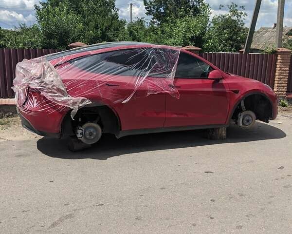 Красный Тесла Model Y, объемом двигателя 0 л и пробегом 50 тыс. км за 27500 $, фото 1 на Automoto.ua