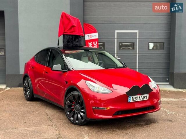 Червоний Тесла Model Y, об'ємом двигуна 0 л та пробігом 25 тис. км за 30999 $, фото 1 на Automoto.ua