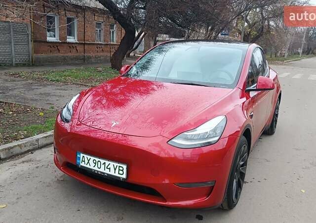 Красный Тесла Model Y, объемом двигателя 0 л и пробегом 51 тыс. км за 27500 $, фото 1 на Automoto.ua