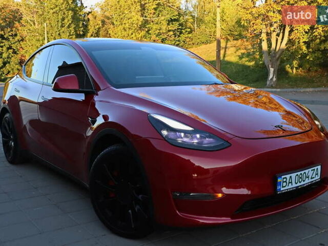 Красный Тесла Model Y, объемом двигателя 0 л и пробегом 72 тыс. км за 28999 $, фото 1 на Automoto.ua