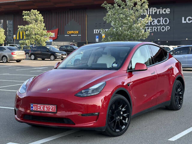 Червоний Тесла Model Y, об'ємом двигуна 0 л та пробігом 50 тис. км за 25300 $, фото 1 на Automoto.ua