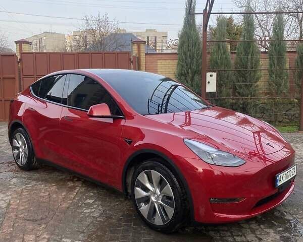 Червоний Тесла Model Y, об'ємом двигуна 0 л та пробігом 24 тис. км за 27800 $, фото 1 на Automoto.ua