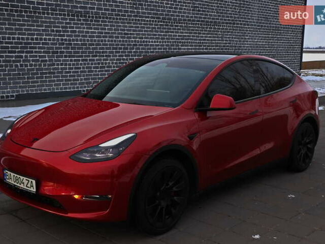 Красный Тесла Model Y, объемом двигателя 0 л и пробегом 69 тыс. км за 29999 $, фото 1 на Automoto.ua