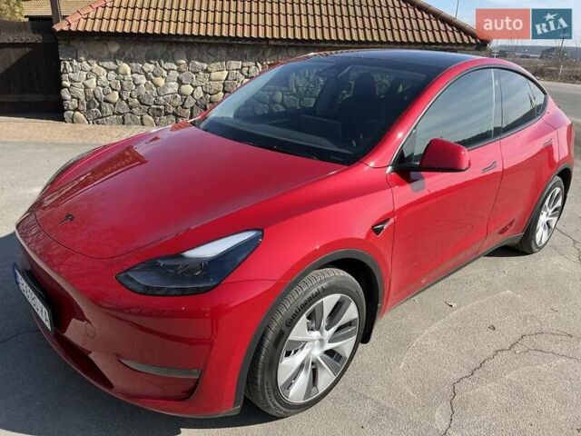 Красный Тесла Model Y, объемом двигателя 0 л и пробегом 31 тыс. км за 30888 $, фото 1 на Automoto.ua