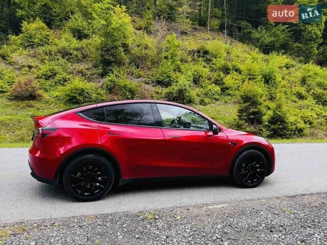 Красный Тесла Model Y, объемом двигателя 0 л и пробегом 53 тыс. км за 24800 $, фото 1 на Automoto.ua