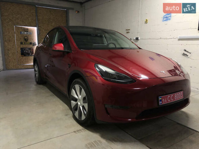 Красный Тесла Model Y, объемом двигателя 0 л и пробегом 95 тыс. км за 33000 $, фото 1 на Automoto.ua