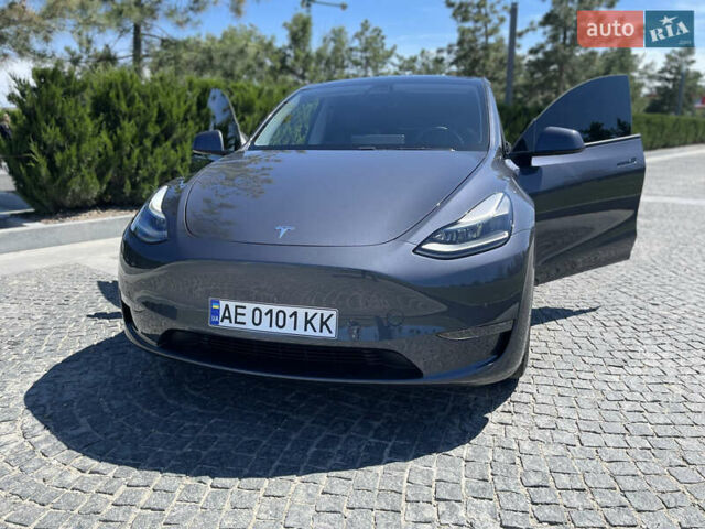 Серый Тесла Model Y, объемом двигателя 0 л и пробегом 15 тыс. км за 49999 $, фото 1 на Automoto.ua