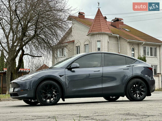 Серый Тесла Model Y, объемом двигателя 0 л и пробегом 121 тыс. км за 22999 $, фото 1 на Automoto.ua