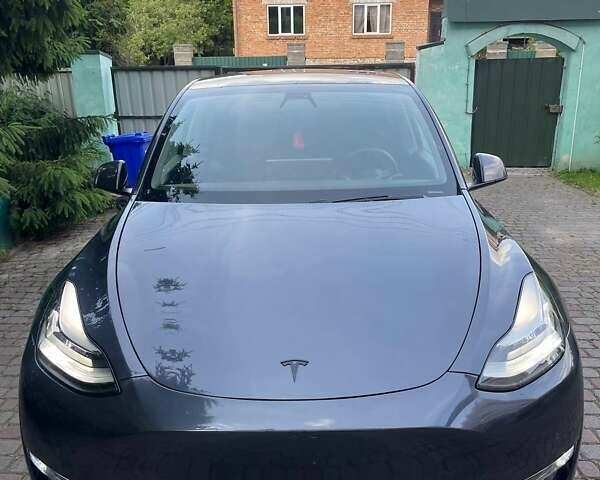 Серый Тесла Model Y, объемом двигателя 0 л и пробегом 83 тыс. км за 21499 $, фото 1 на Automoto.ua
