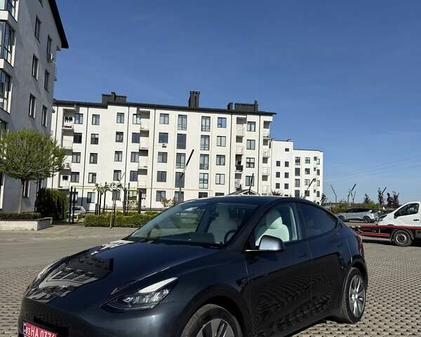 Серый Тесла Model Y, объемом двигателя 0 л и пробегом 143 тыс. км за 20500 $, фото 1 на Automoto.ua