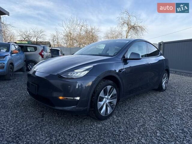 Серый Тесла Model Y, объемом двигателя 0 л и пробегом 143 тыс. км за 19999 $, фото 1 на Automoto.ua