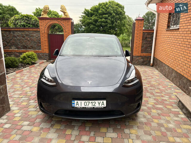 Серый Тесла Model Y, объемом двигателя 0 л и пробегом 41 тыс. км за 28500 $, фото 1 на Automoto.ua