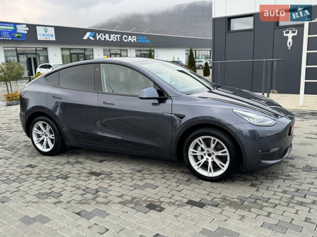 Серый Тесла Model Y, объемом двигателя 0 л и пробегом 128 тыс. км за 20300 $, фото 1 на Automoto.ua