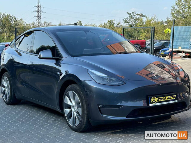 Серый Тесла Model Y, объемом двигателя 75 л и пробегом 125 тыс. км за 24000 $, фото 1 на Automoto.ua