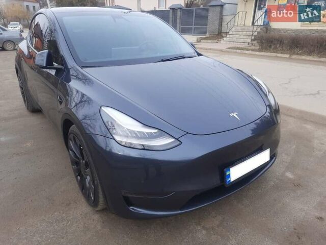 Серый Тесла Model Y, объемом двигателя 0 л и пробегом 48 тыс. км за 28500 $, фото 1 на Automoto.ua