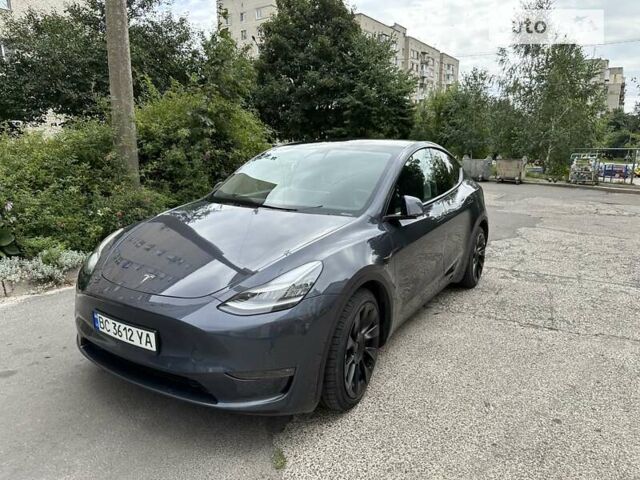 Серый Тесла Model Y, объемом двигателя 0 л и пробегом 62 тыс. км за 33000 $, фото 1 на Automoto.ua