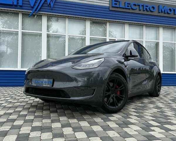 Серый Тесла Model Y, объемом двигателя 0 л и пробегом 77 тыс. км за 30555 $, фото 1 на Automoto.ua