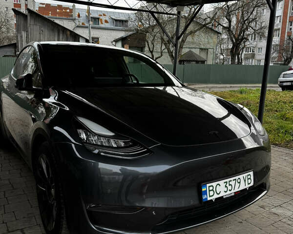 Серый Тесла Model Y, объемом двигателя 0 л и пробегом 94 тыс. км за 23000 $, фото 1 на Automoto.ua