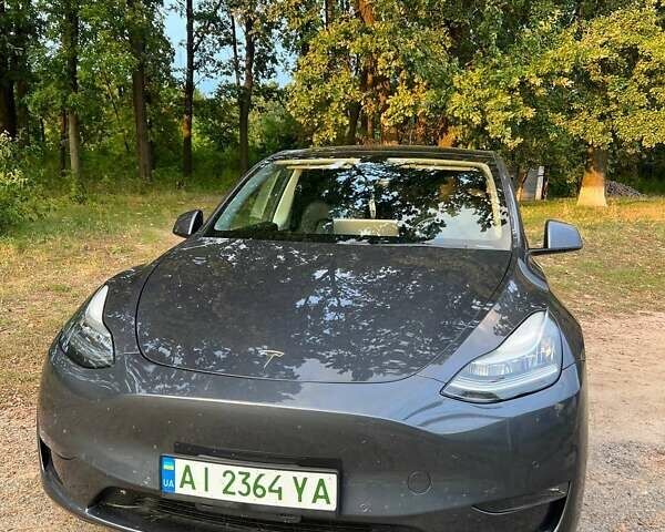 Серый Тесла Model Y, объемом двигателя 0 л и пробегом 52 тыс. км за 34000 $, фото 1 на Automoto.ua