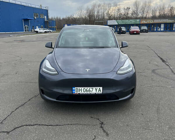 Серый Тесла Model Y, объемом двигателя 0 л и пробегом 99 тыс. км за 22300 $, фото 1 на Automoto.ua