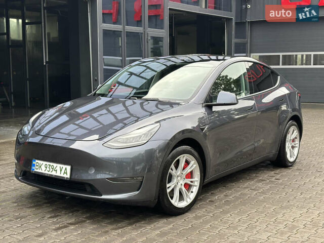 Серый Тесла Model Y, объемом двигателя 0 л и пробегом 92 тыс. км за 23500 $, фото 1 на Automoto.ua