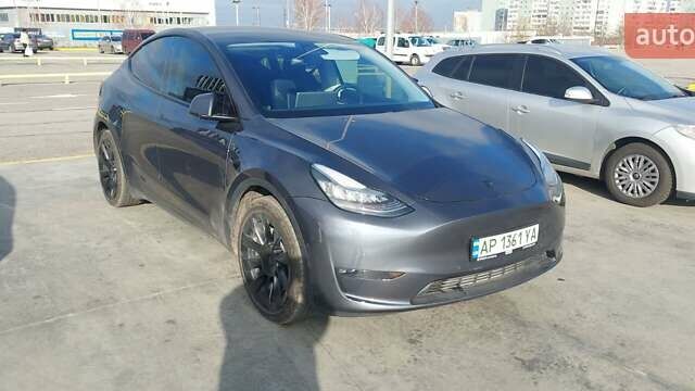 Серый Тесла Model Y, объемом двигателя 0 л и пробегом 122 тыс. км за 21500 $, фото 1 на Automoto.ua