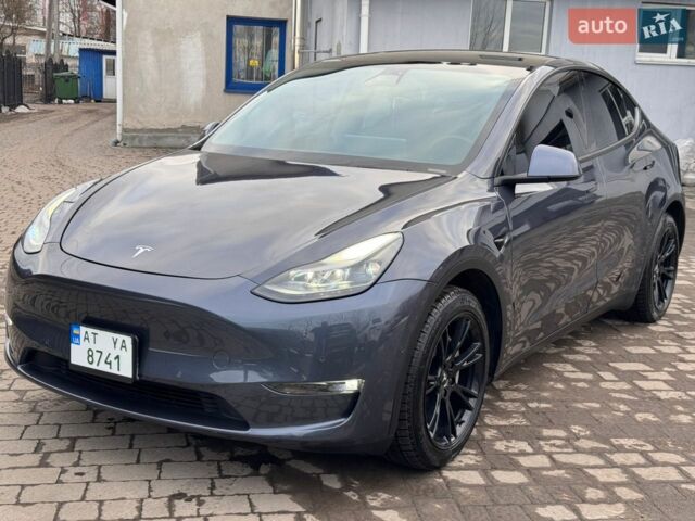 Серый Тесла Model Y, объемом двигателя 0 л и пробегом 115 тыс. км за 20950 $, фото 1 на Automoto.ua