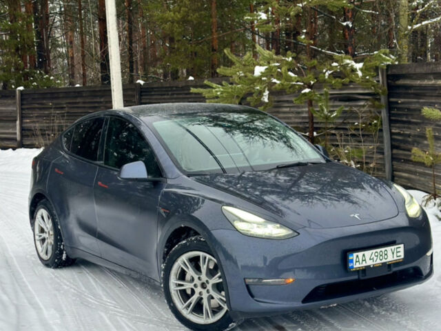 Серый Тесла Model Y, объемом двигателя 0 л и пробегом 77 тыс. км за 23000 $, фото 1 на Automoto.ua