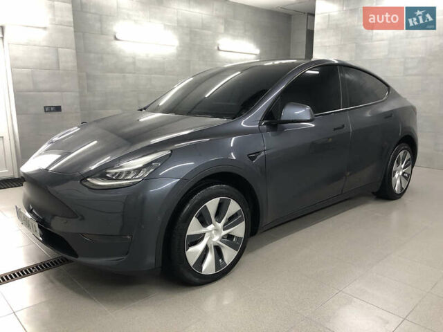 Серый Тесла Model Y, объемом двигателя 0 л и пробегом 12 тыс. км за 28500 $, фото 1 на Automoto.ua