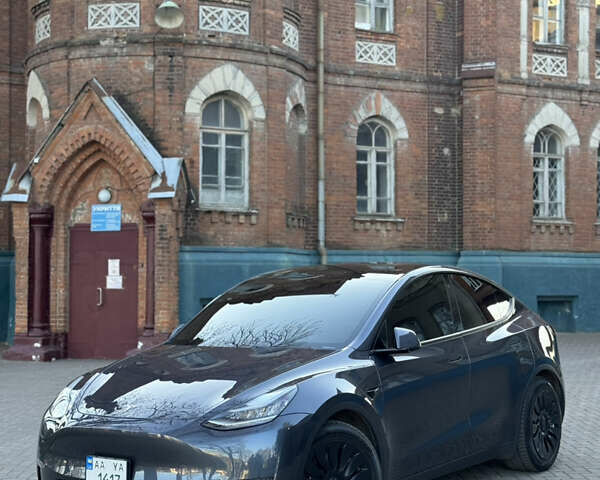 Серый Тесла Model Y, объемом двигателя 0 л и пробегом 65 тыс. км за 23000 $, фото 1 на Automoto.ua