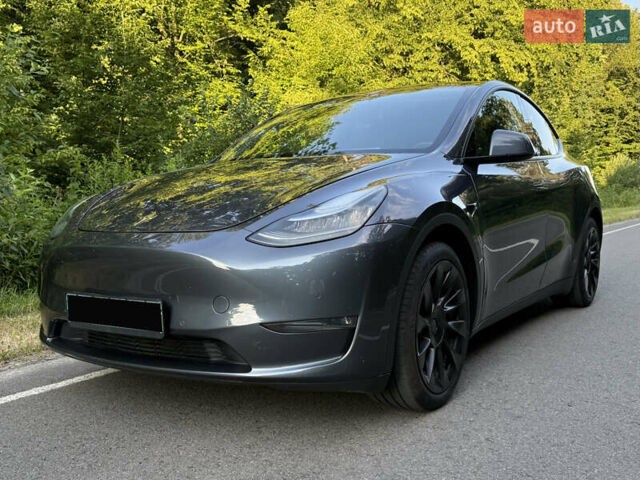 Серый Тесла Model Y, объемом двигателя 0 л и пробегом 61 тыс. км за 23200 $, фото 1 на Automoto.ua